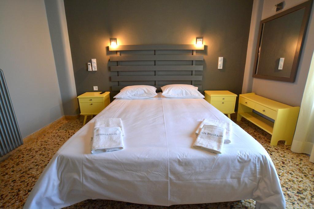 Leonidaion Guesthouse Ancient Olympia Ruang foto A bedroom in a hotel