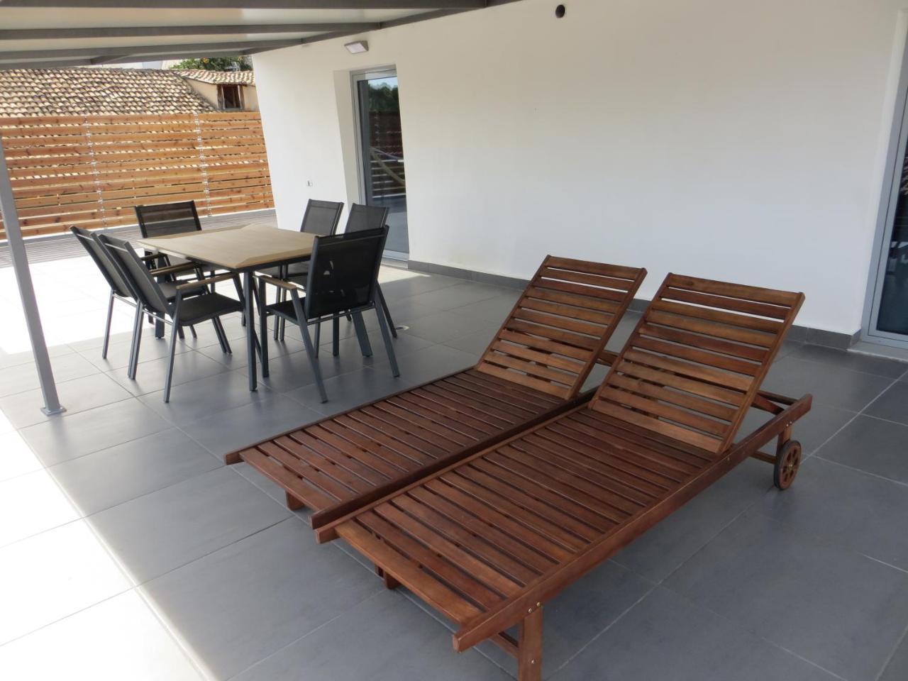 Leonidaion Guesthouse Ancient Olympia Bagian luar foto Outdoor furniture