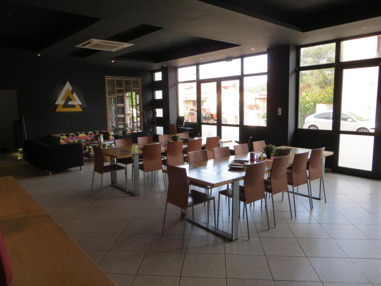 Leonidaion Guesthouse Ancient Olympia Bagian luar foto The interior of a Thai restaurant in France